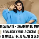 Tiguida Kanté vêtue d'une chemise bleue posant pour son single Champion Du Monde