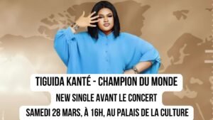 Tiguida Kanté vêtue d'une chemise bleue posant pour son single Champion Du Monde