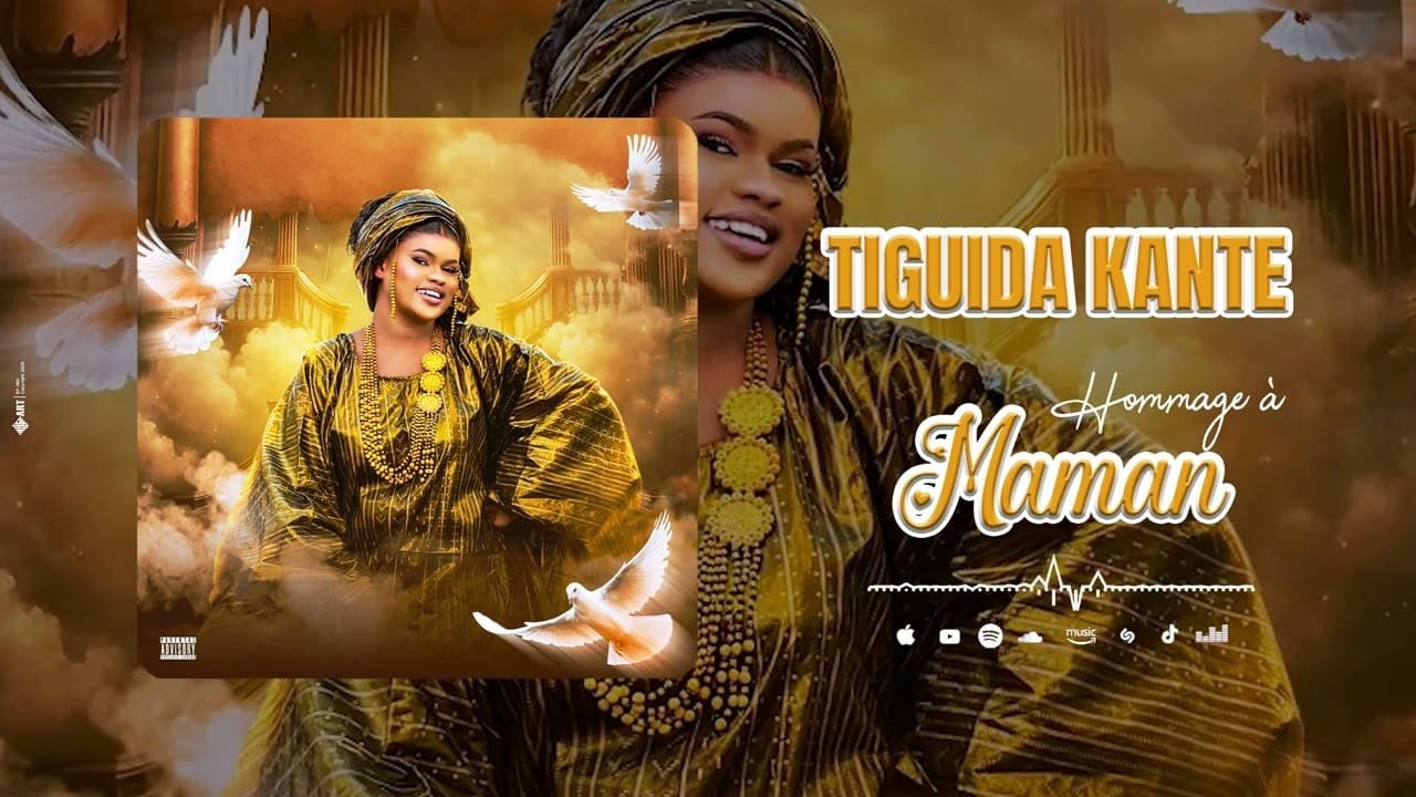 Tiguida Kanté wearing golden outfit in Tribute to Mom cover with white doves symbolizing peace